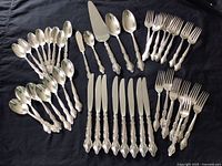 All pieces laid out on black cloth