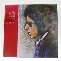 Front album cover showing title and photo