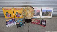 Overall lot with language courses, globe, puzzles, games