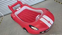 Top angled view of red inflatable car bed fully inflated