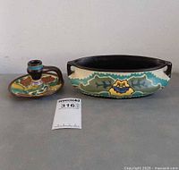 Candlestick holder and bowl side by side