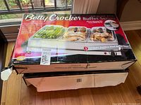 Two boxed Betty Crocker buffet servers stacked