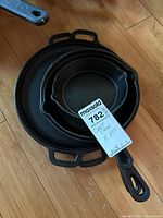 Stack of nested cast iron pans