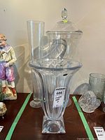 Full view of three glass pieces on table
