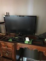 Front view of LG monitor with wall mount pieces in front