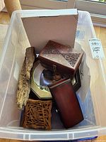 Overview of lot inside plastic bin showing all items