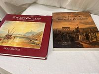 Both books front covers visible