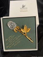 Rose figurine in presentation box showing crystal bud and gold stem