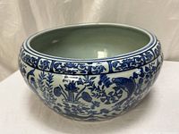 Overall view of blue and white porcelain fish bowl planter