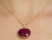 Pendant on model showing scale and chain for context