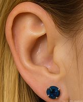 ear stud worn in ear showing size and colour