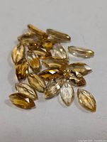 Group of marquise-cut citrines showing color and faceting
