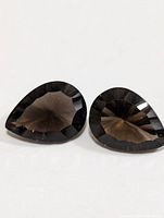 Two pear-cut smoky quartz stones close-up