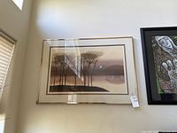 Full view of framed landscape print on wall
