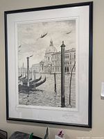 Full view of framed artwork on wall