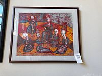 Full view of framed J.J. Cromer artwork on wall