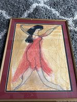 Full view of framed artwork showing composition and frame