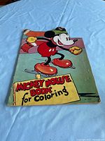 Front cover showing title, Mickey graphic, No.2121, edge wear