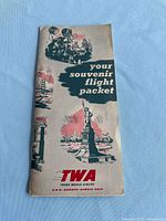 Front cover of TWA souvenir flight packet