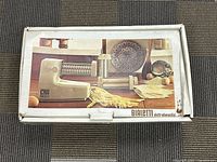 Closed box showing product image and branding