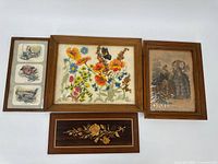 Front view showing all four framed artworks