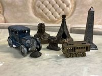 Group shot showing all six metal miniatures