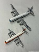 Both die-cast airplane models shown from above