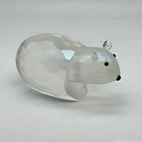 Full side view of faceted glass bear