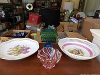 Full lot showing two porcelain pieces, green lidded glass dish and Peppermint Swirl dish