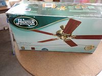 Box front showing Hunter Silent Breeze ceiling fan image and branding