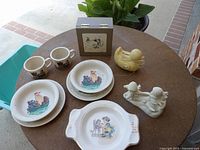 Group shot showing all items in lot on round table