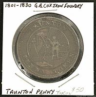 Obverse view showing foundry worker and legends within coin holder