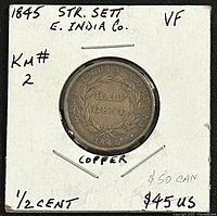 Reverse of 1845 Straits Settlements 1/2 Cent in 2x2 holder showing HALF CENT within wreath