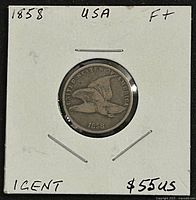 Obverse of 1858 Flying Eagle cent in holder