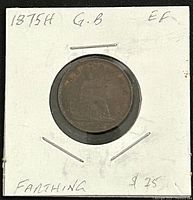 Obverse side of 1875H Queen Victoria farthing in cardboard flip