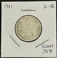 Reverse of 1901 Canadian 25-cent coin in holder showing denomination, date, grade note and silver content