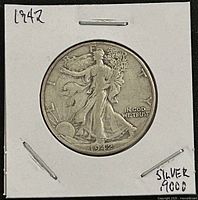 Obverse of 1942 Walking Liberty Half Dollar in coin flip