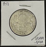 Reverse of 1953 Canadian 50-cent coin showing coat of arms