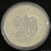 Reverse of 2018 Silver Maple Leaf coin showing large 30 over maple leaf, purity, weight, denomination details
