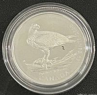 Reverse showing Osprey and denomination within capsule
