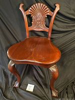 Full view of carved wood chair