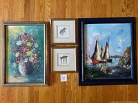 Group shot of all four framed artworks