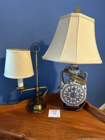 Both lamps side by side on table showing overall form and shades