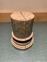 Bookends aligned to show cylindrical form