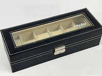 Closed leather watch case showing glass window and clasp