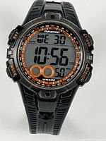 Front view showing digital display, bezel, face details