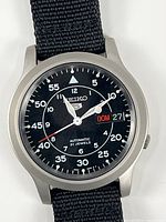 Front view showing dial, case and strap