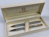 Full view of pen and pencil set in open presentation box