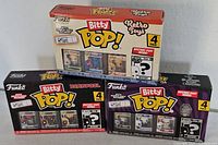 Three sealed Funko Bitty Pop! packs: Retro Toys, Deadpool, Nightmare Before Christmas stacked