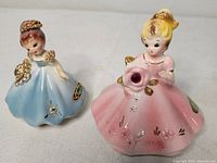 Both Joseph Originals figurines together